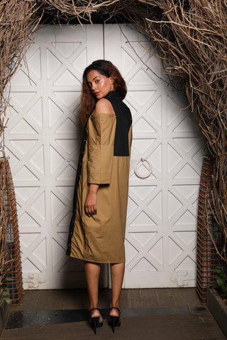 Two-toned  shirt dress features khaki and black vertical panels with cold shoulders.