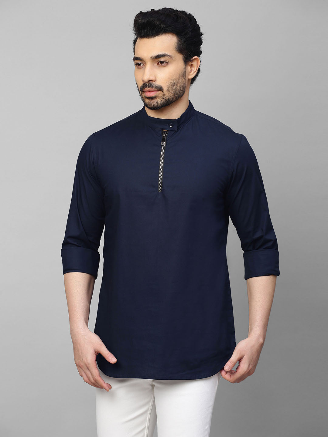 Blue mandarin collar shirt with half zipper detailing.