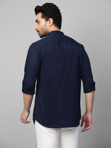 Blue mandarin collar shirt with half zipper detailing.