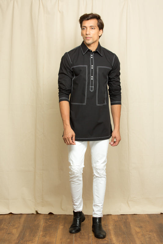 Black kurta shirt with white stitching detailing.