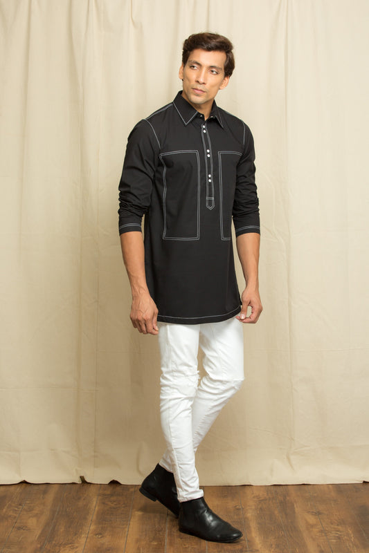 Black kurta shirt with white stitching detailing.