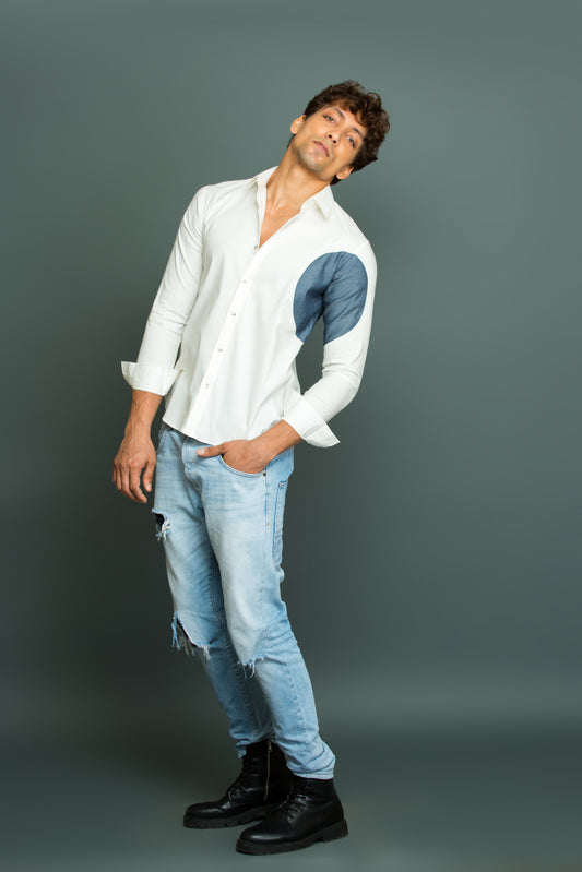 White shirt with denim round patchwork detailing.