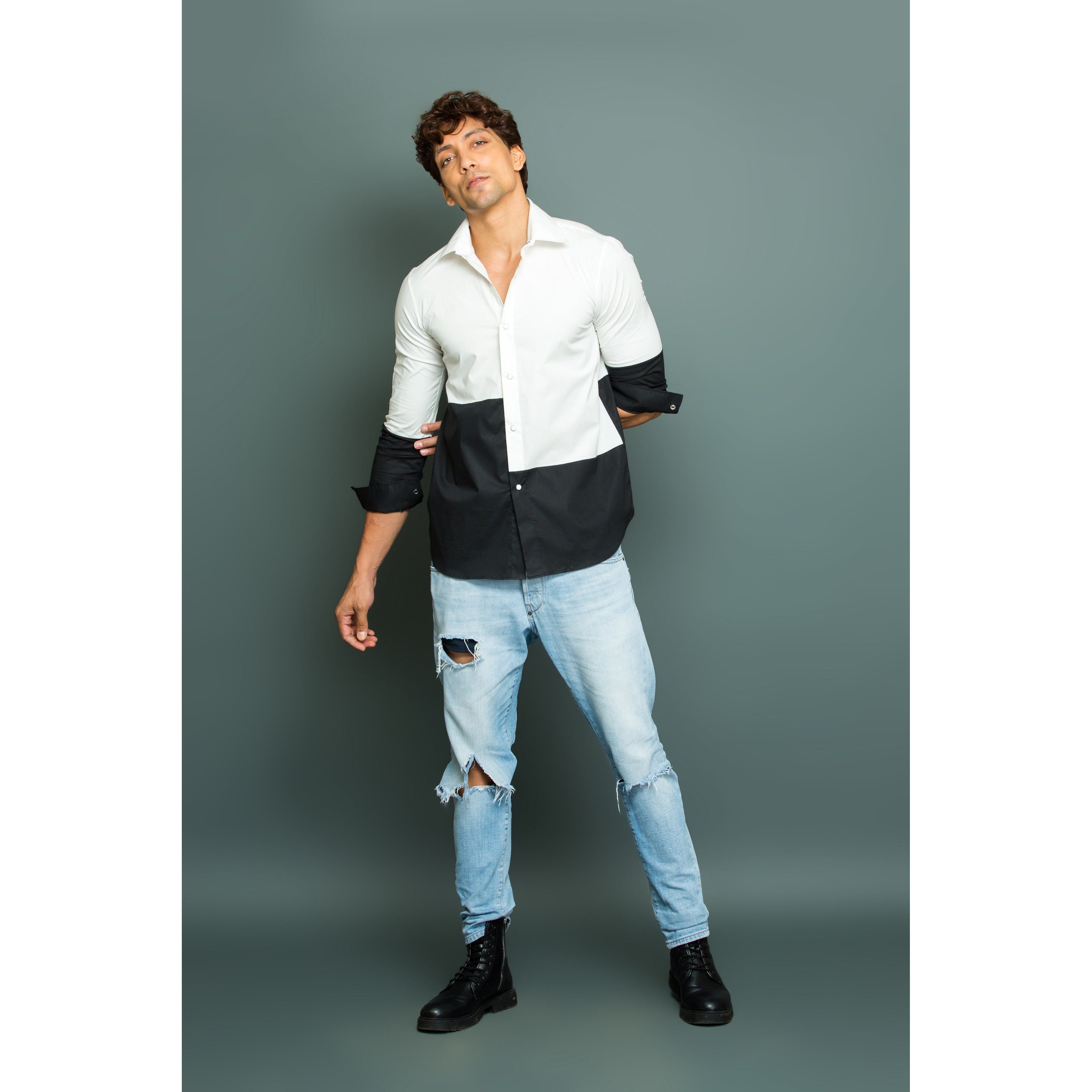 White and Black patch shirt.