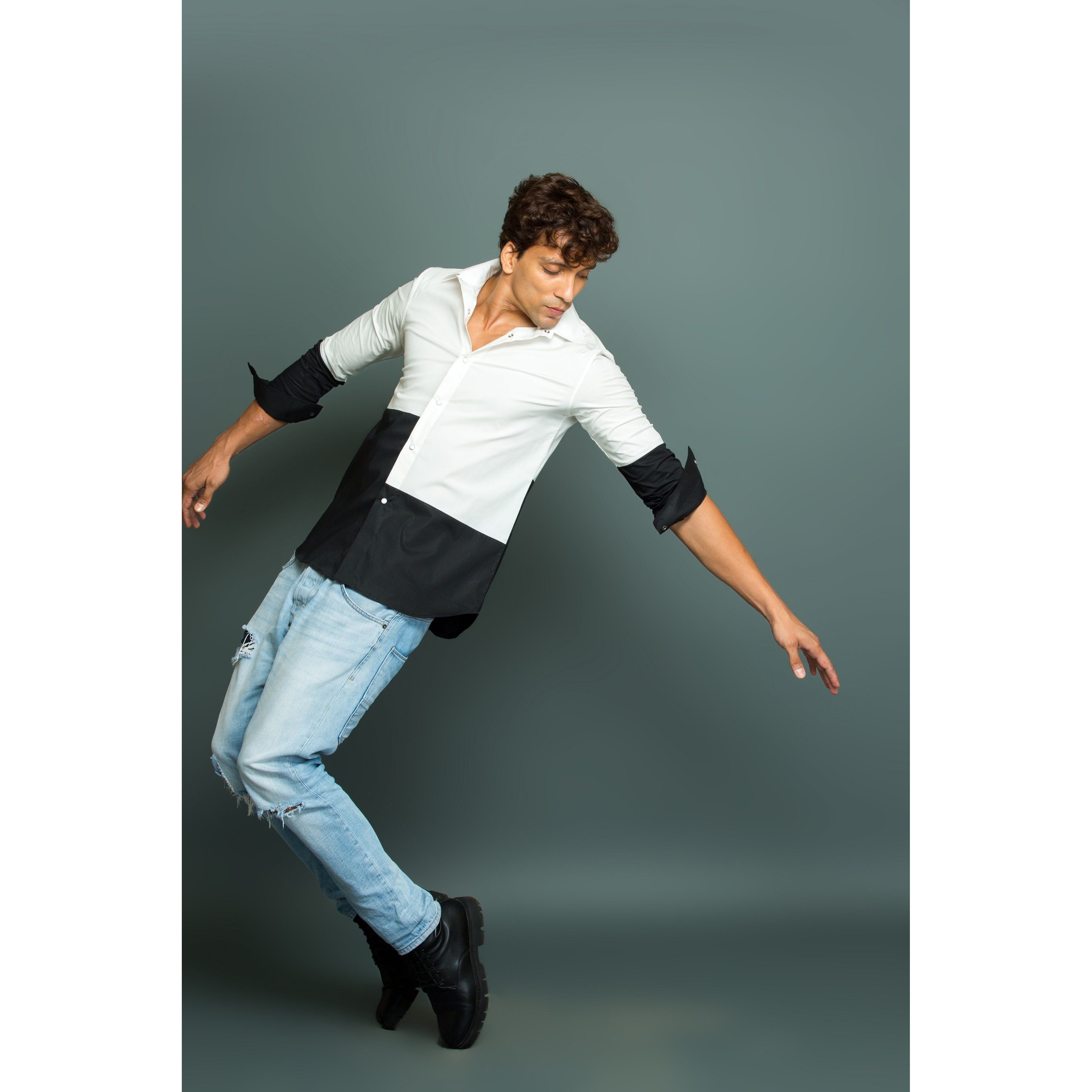 White and Black patch shirt.