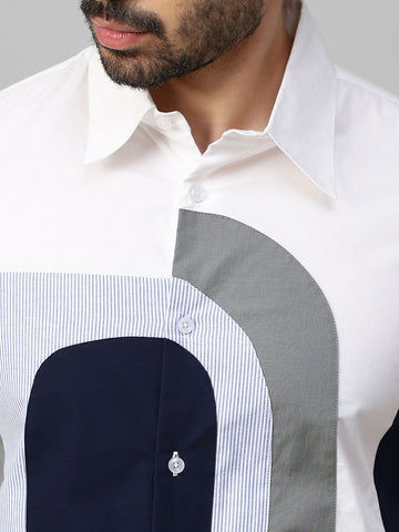 White shirt with color block patch detailing.