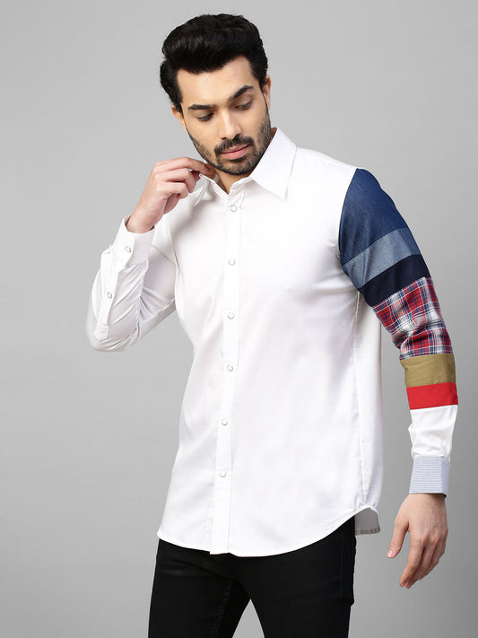 White shirt with patch detailing on one sleeve.