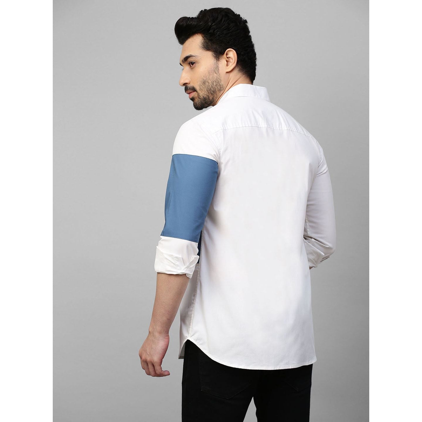 White shirt with patch on sleeve
