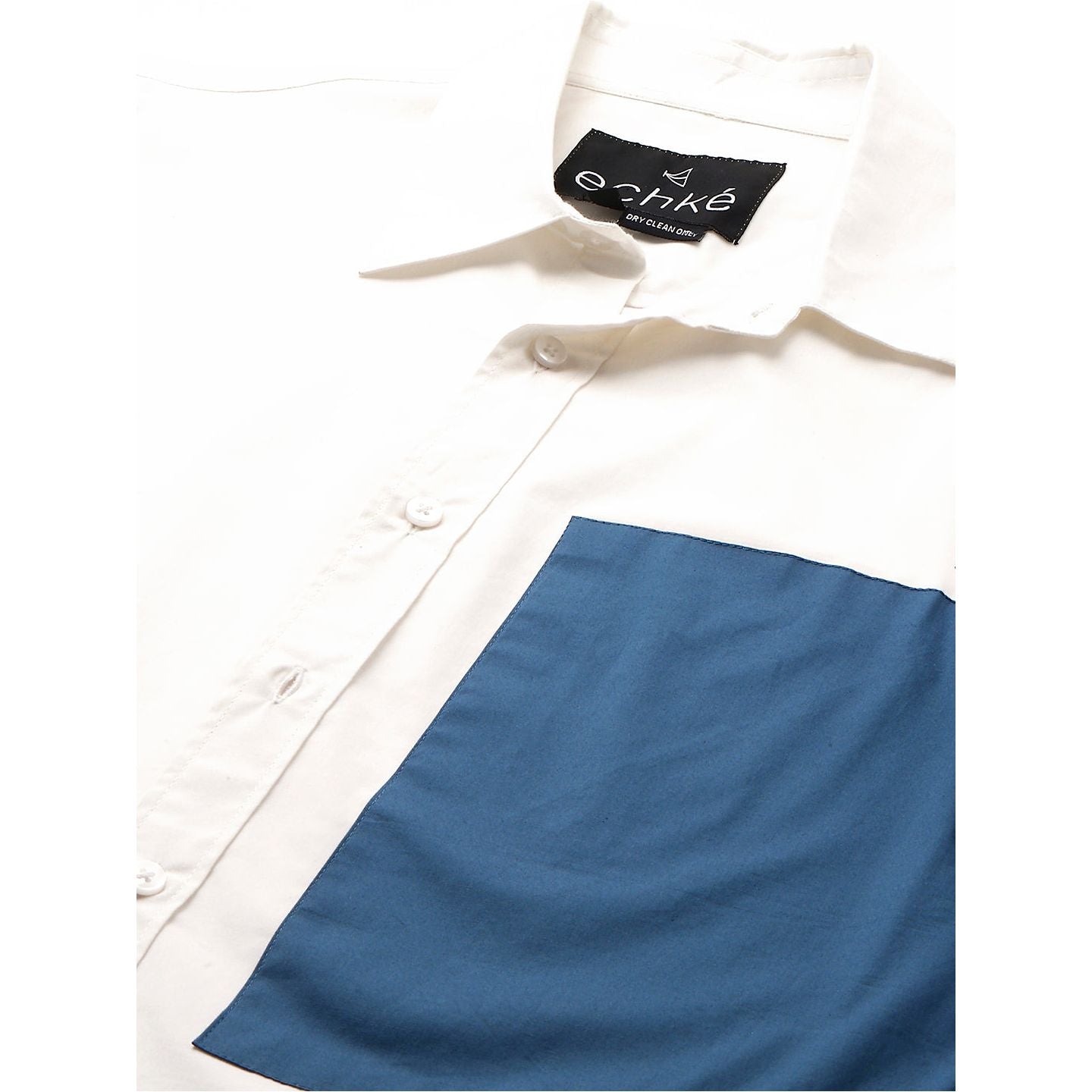 White shirt with patch on sleeve