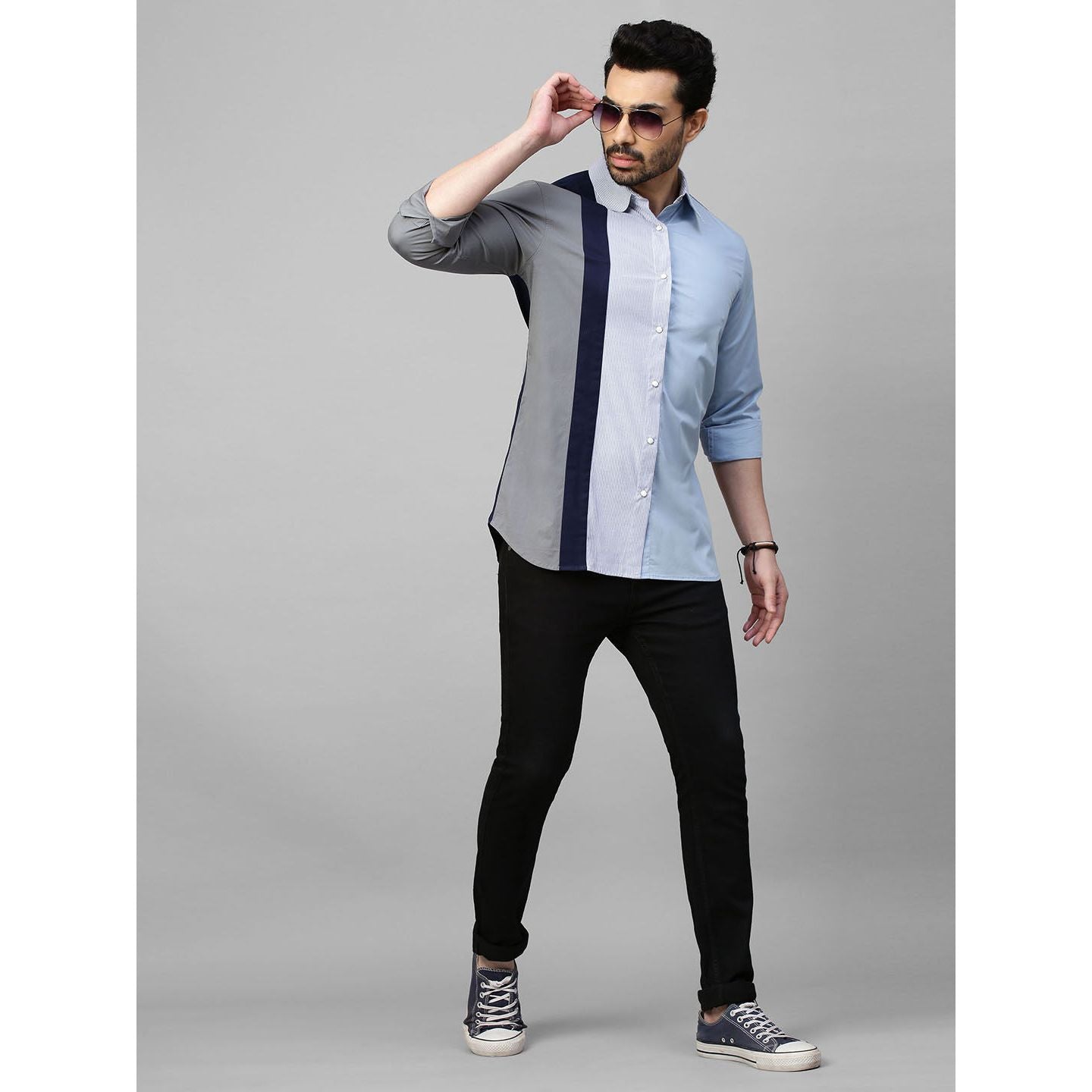 Light blue shirt with multicolor panel on one side