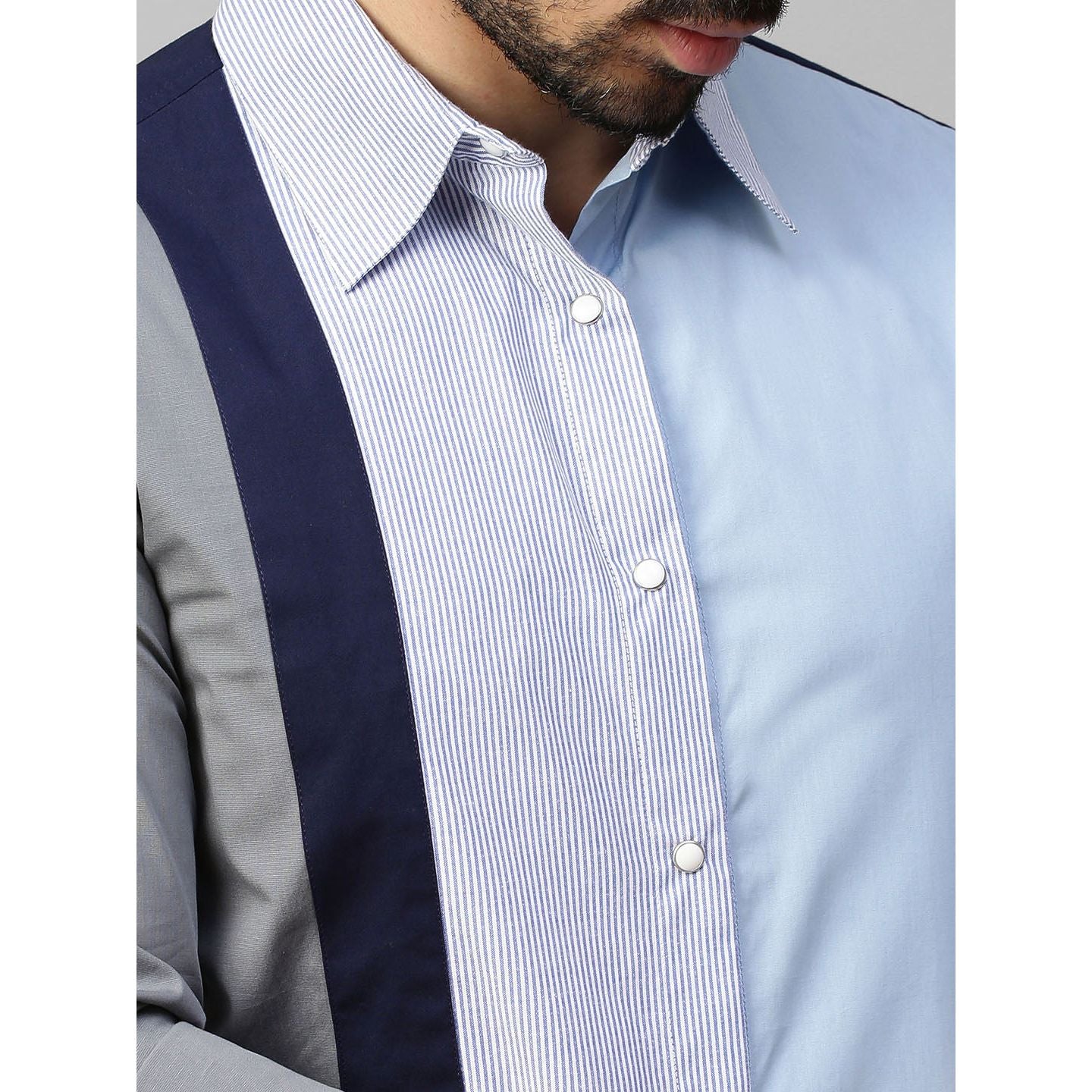 Light blue shirt with multicolor panel on one side