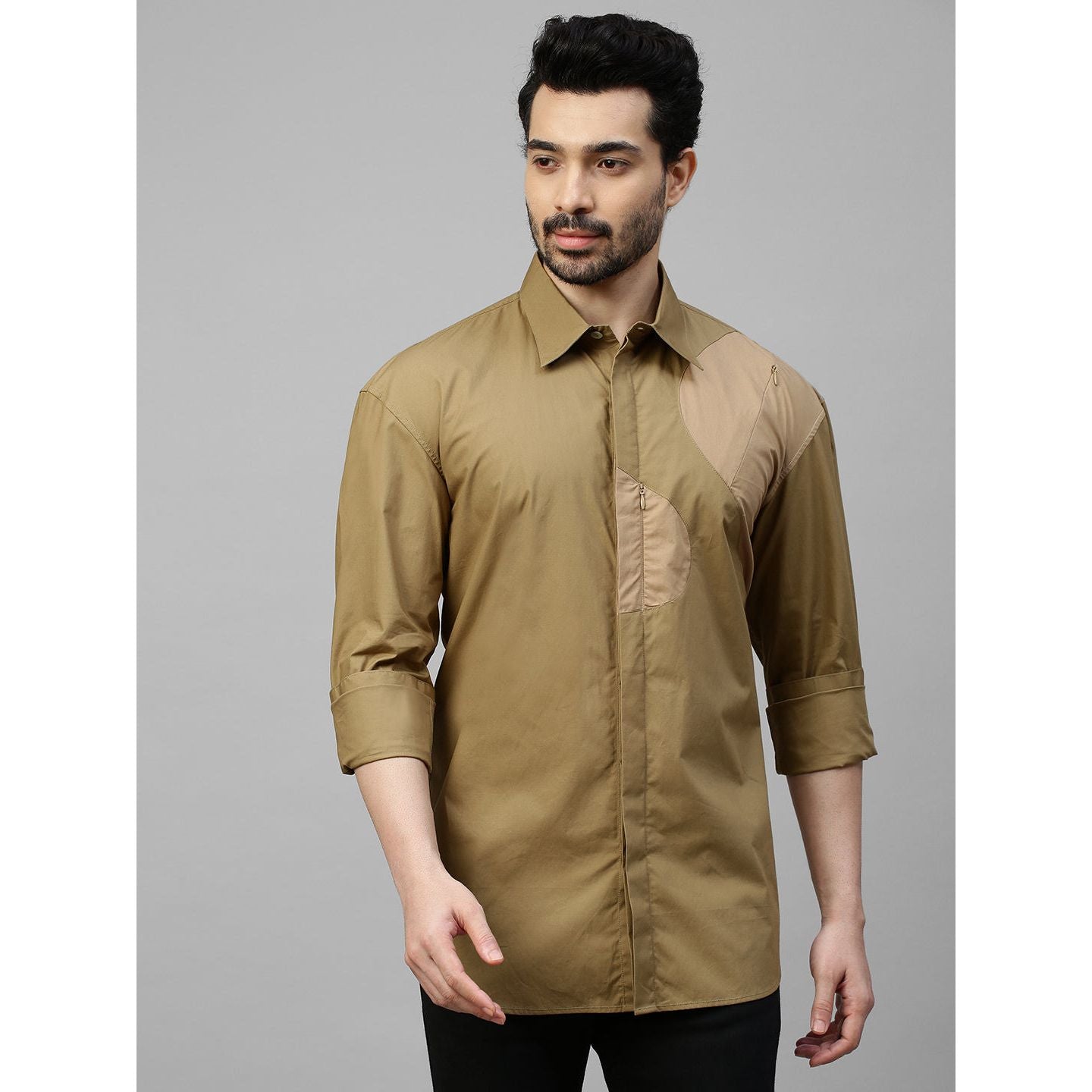 Shades khaki patch work shirt and concealed zipper feature.