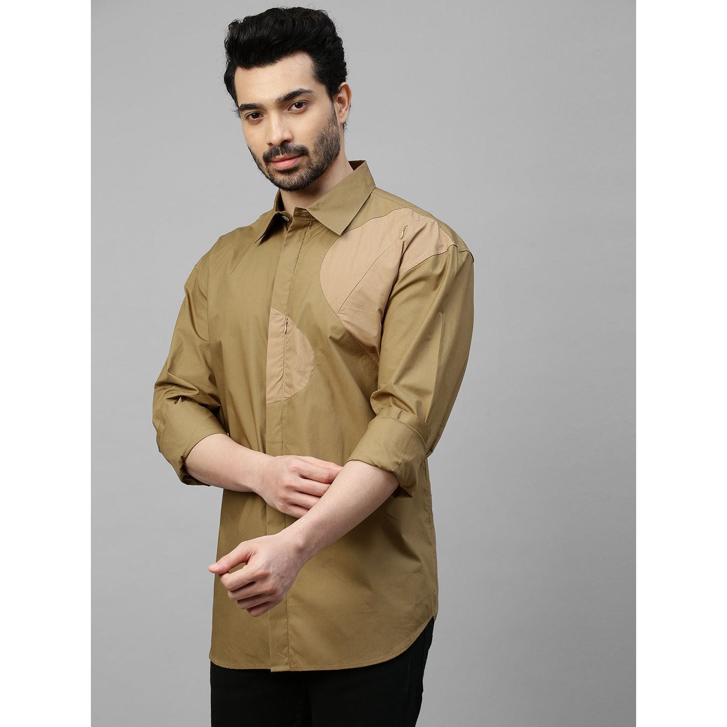 Shades khaki patch work shirt and concealed zipper feature.