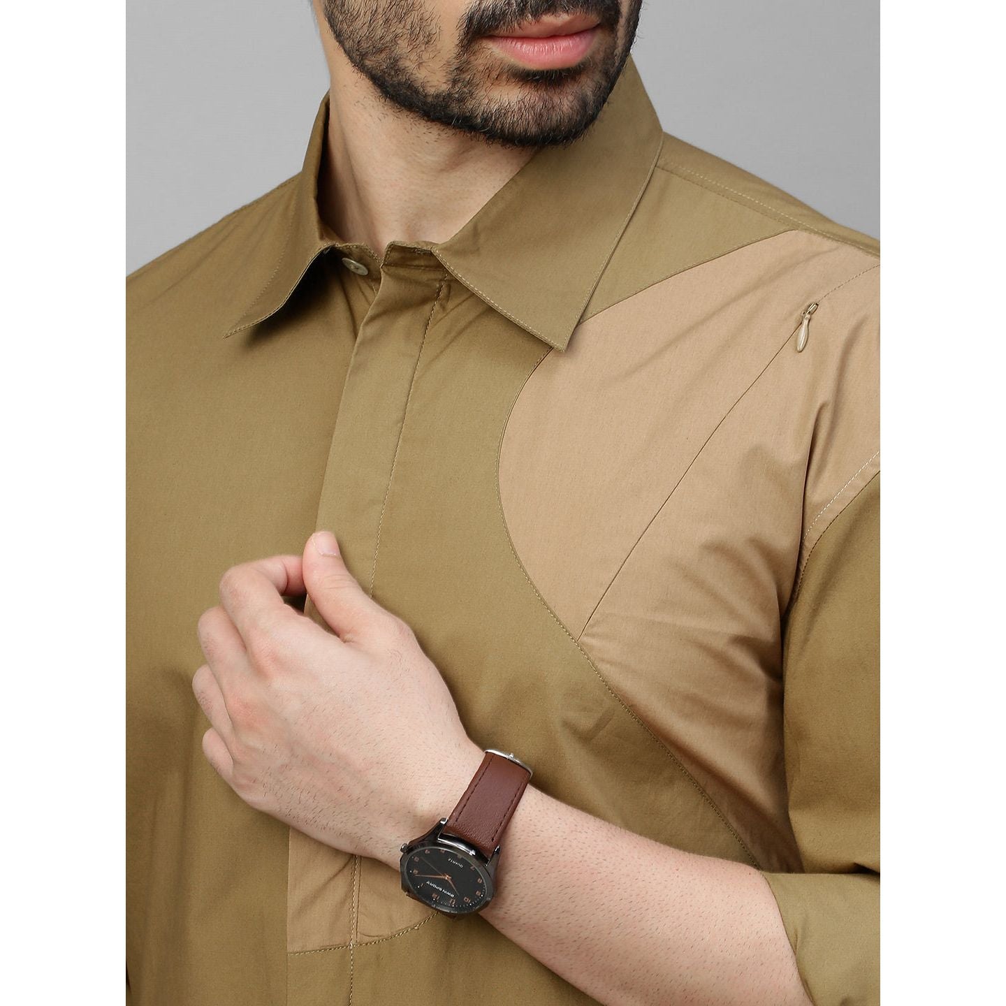 Shades khaki patch work shirt and concealed zipper feature.