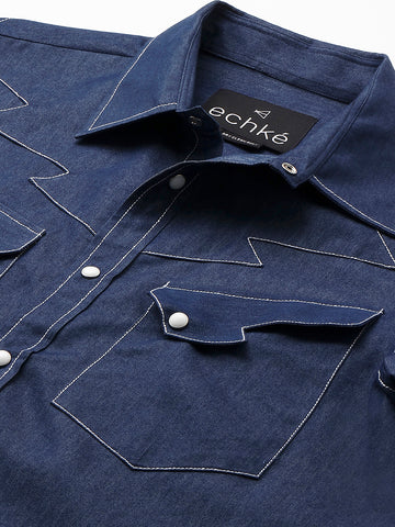 Denim shirt with contrast stitching feature.