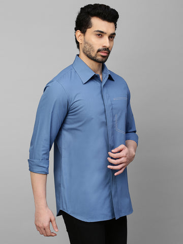 Slate blue classic shirt with white stitching pocket feature.