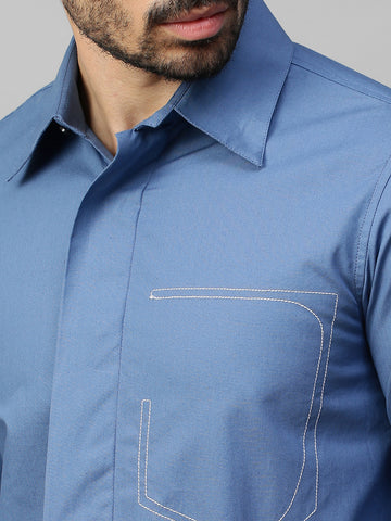 Slate blue classic shirt with white stitching pocket feature.