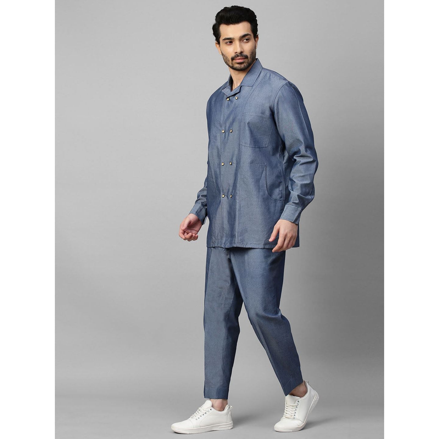 Light denim double breasted shirt with narrow pants.