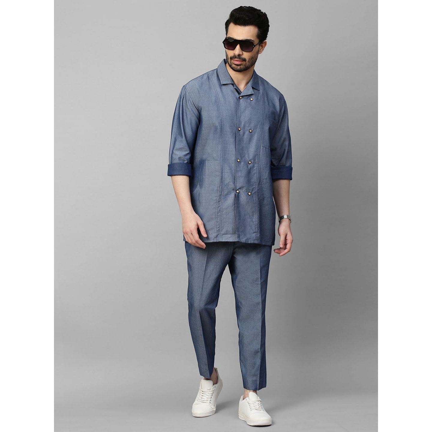 Light denim double breasted shirt with narrow pants.