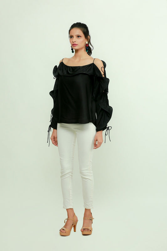 Black silk off-shoulder top features a pleated frill running across the sleeves.