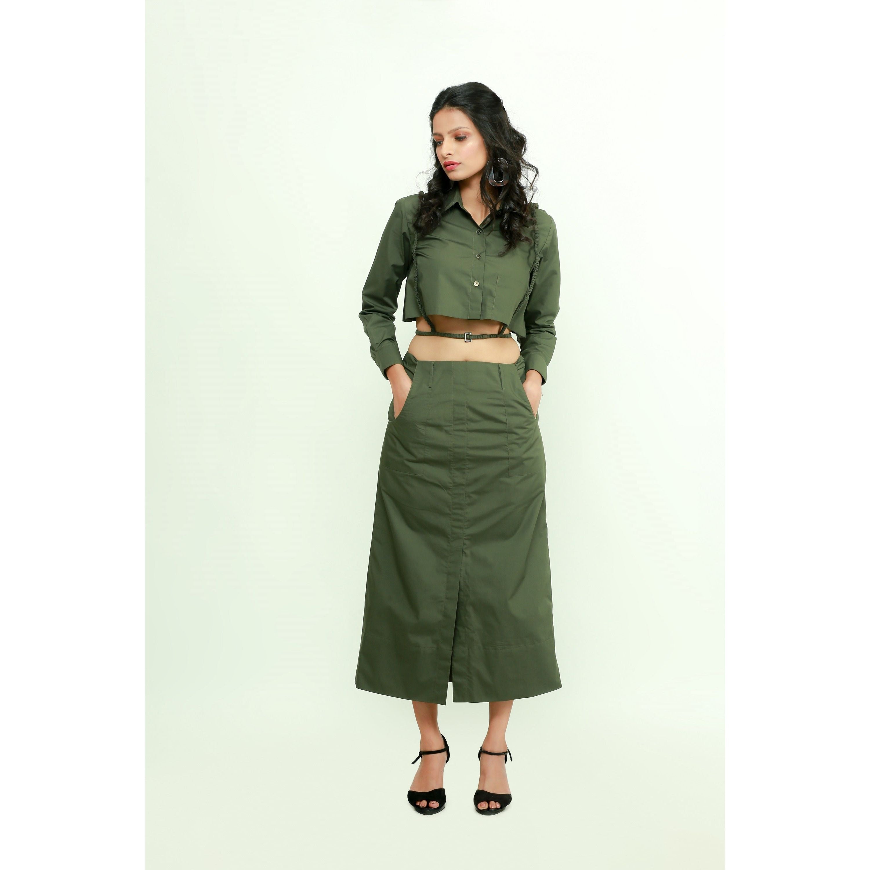 Military green co-ord set features a crop top with harness and a maxi skirt with front slit.