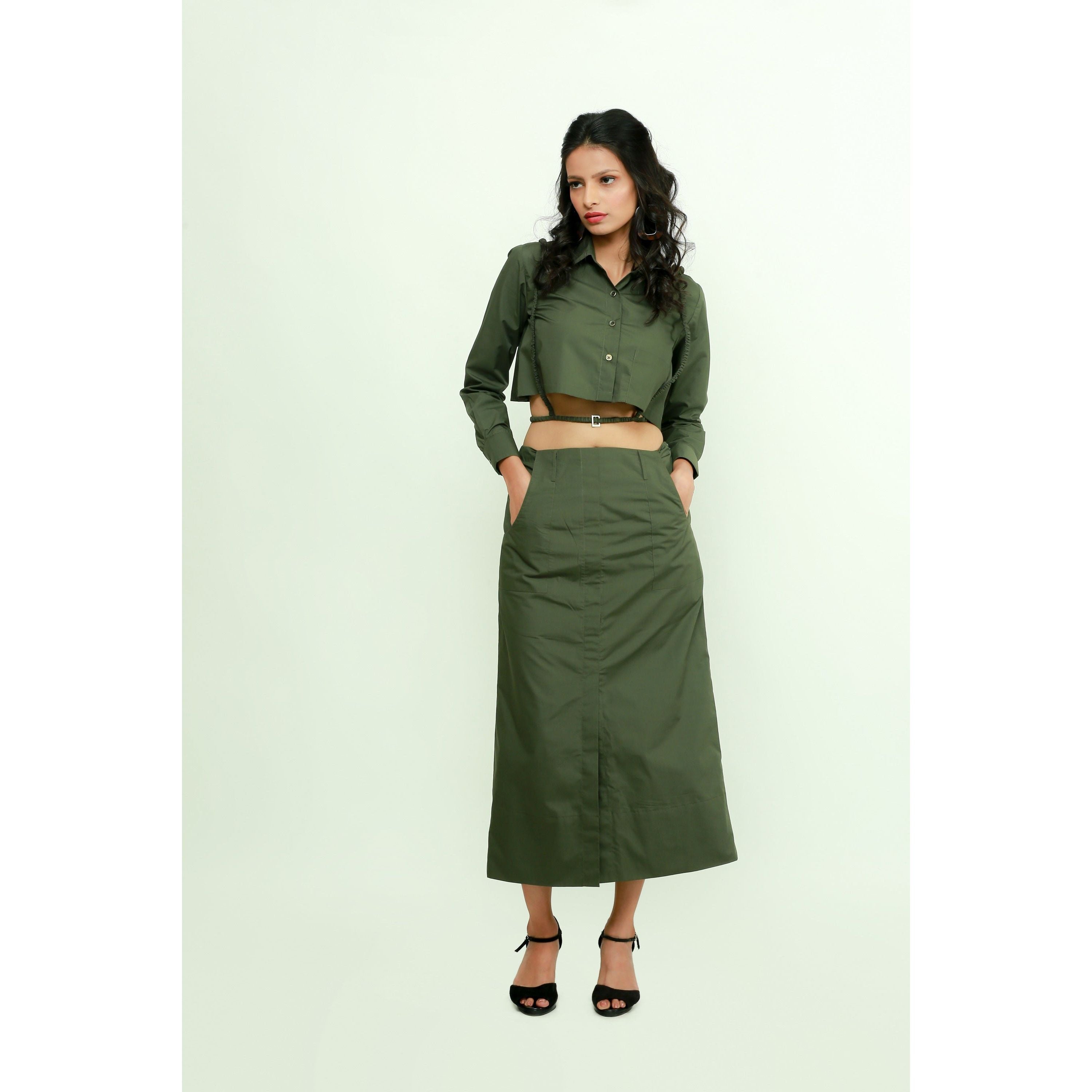 Military green co-ord set features a crop top with harness and a maxi skirt with front slit.