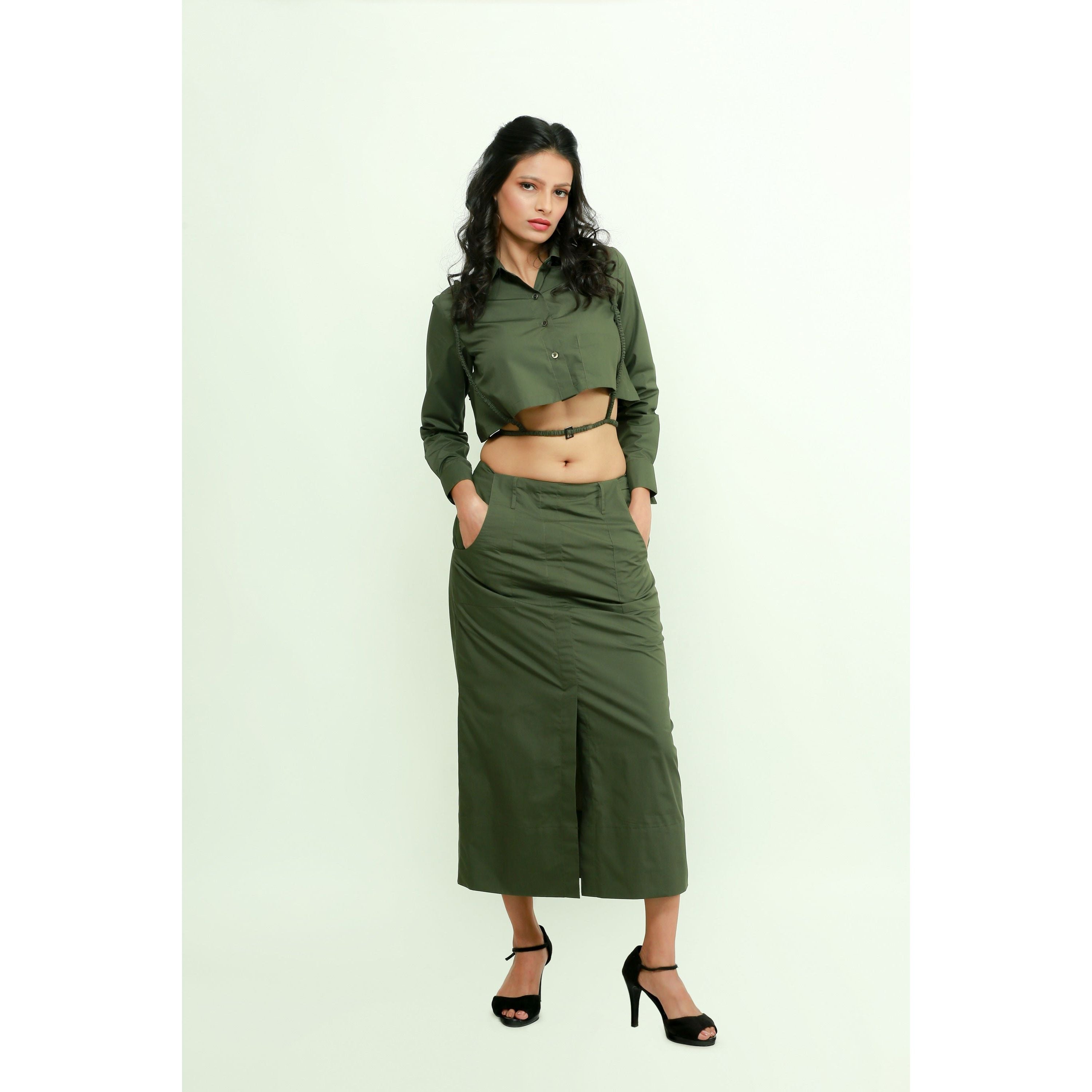 Military green co-ord set features a crop top with harness and a maxi skirt with front slit.