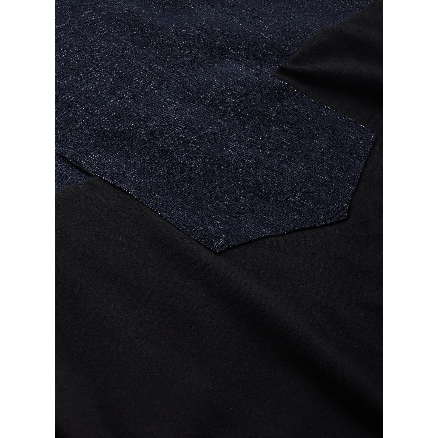 Denim dungaree dress features an assymmetric hemline.