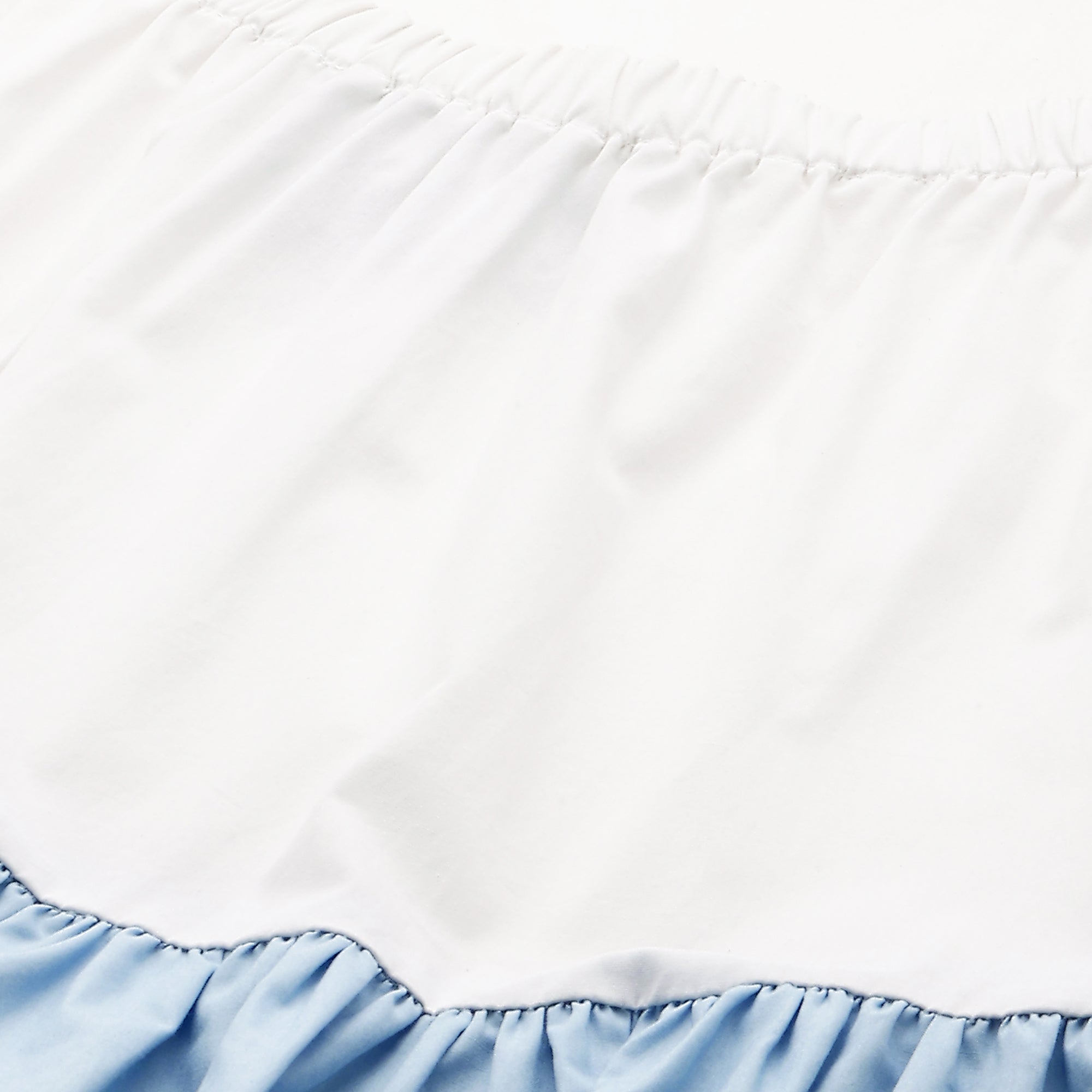 Off-shoulder maxi dress in shades of blue.