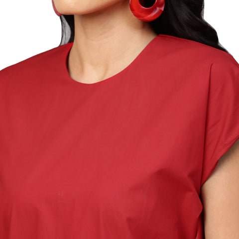 Red cap sleeves dress with assymetric flared feature.