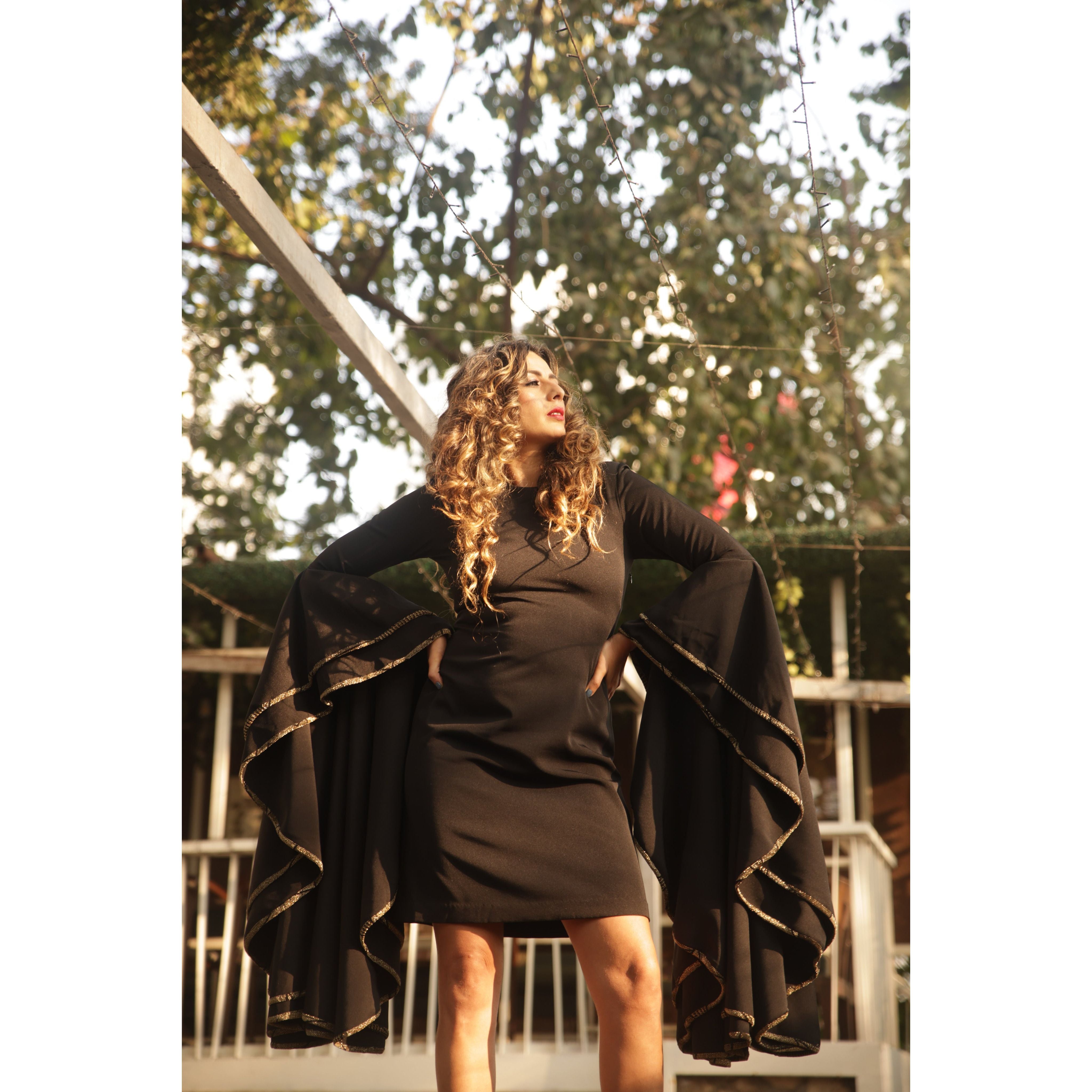 Knee length dress with bell sleeves