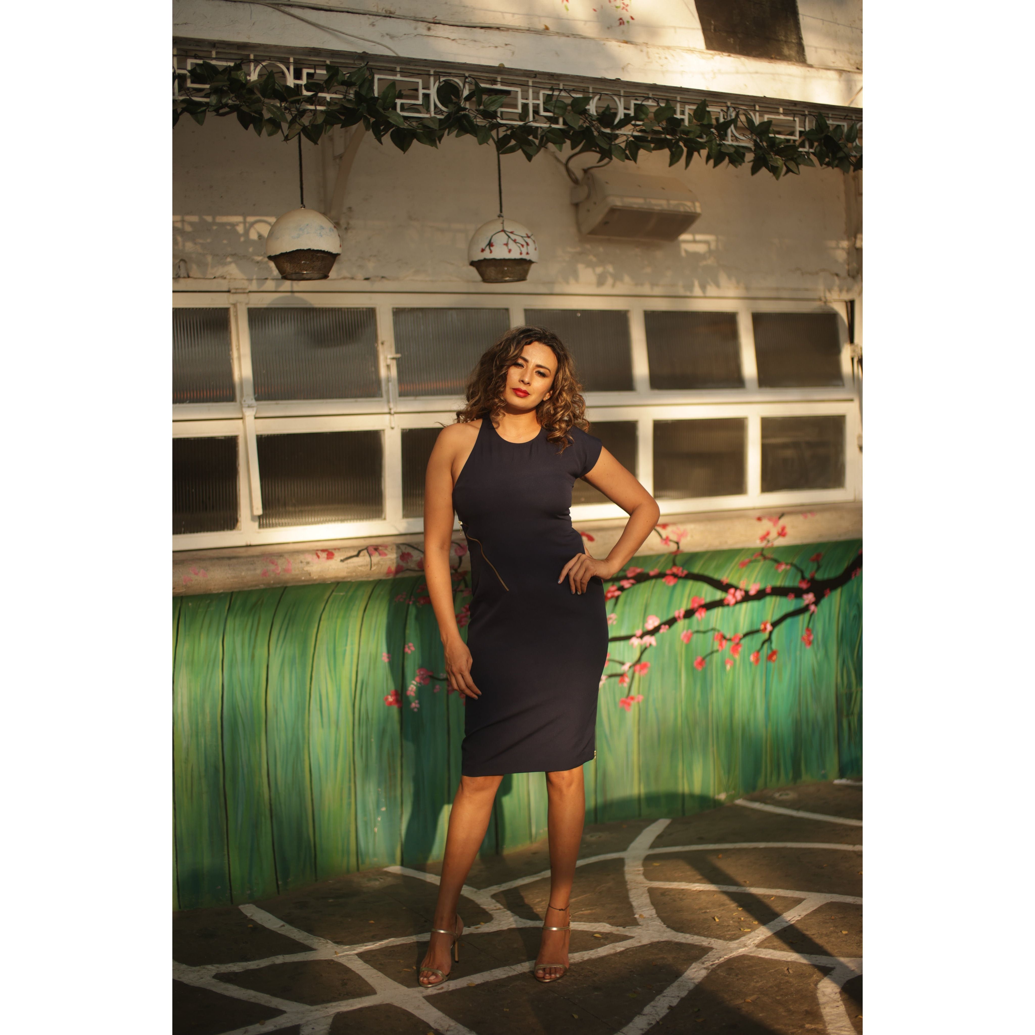 Dress with one sleeve and zipper feature